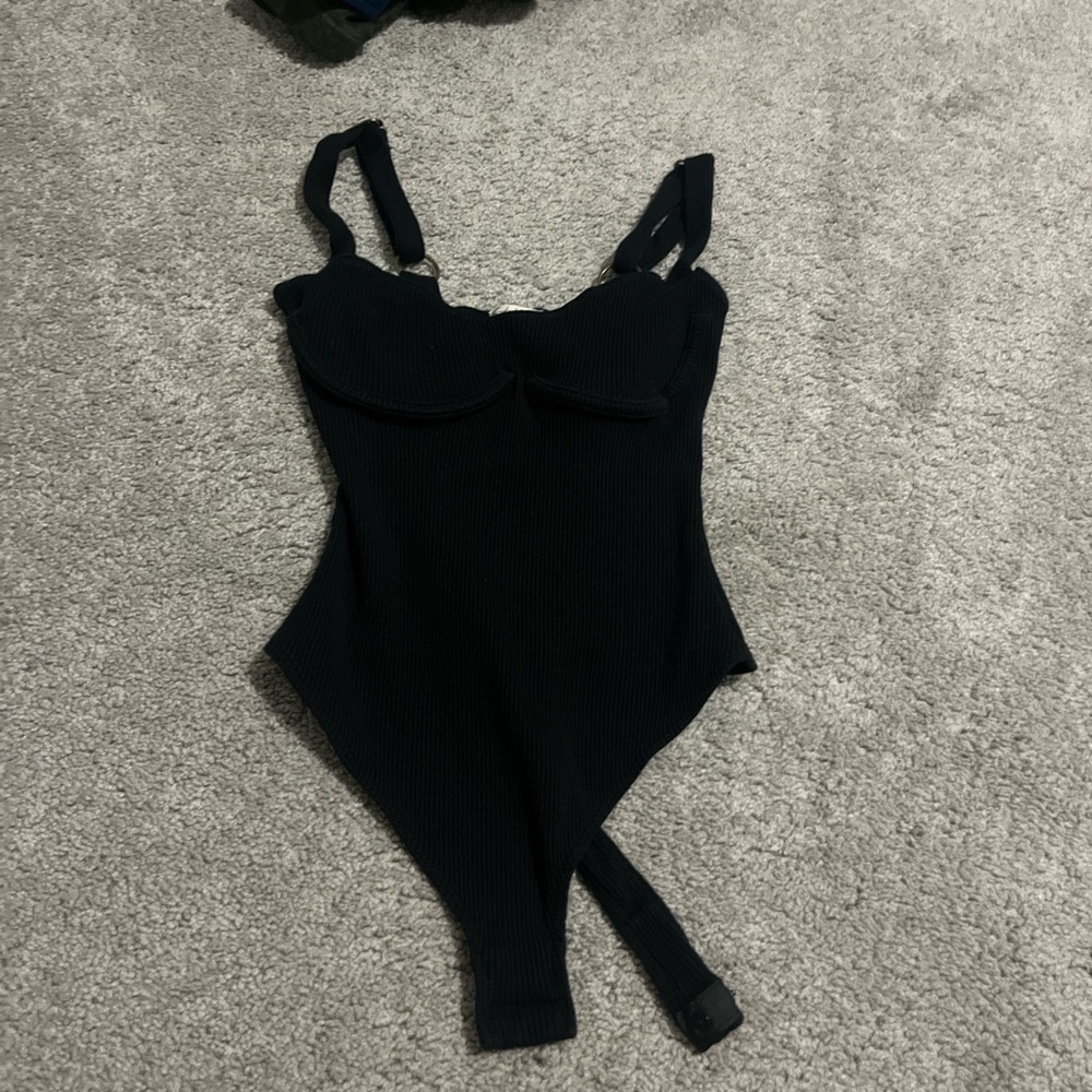 Free People never worn thong body suit with button clasp great condition so cute